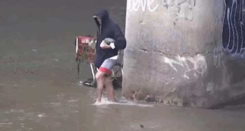 homeless+man+uses+rocks+to+catch+fish_8a