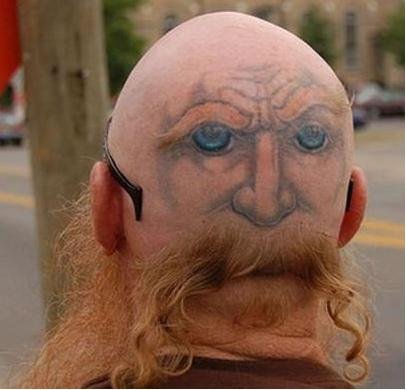2 faces tattoo